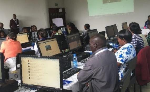 Training in progress. People using computers.