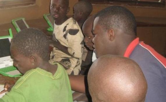 Guided by librarians, children use computers pre-loaded with mother-tongue literacy lessons in Lubuto Library in Lusaka. 